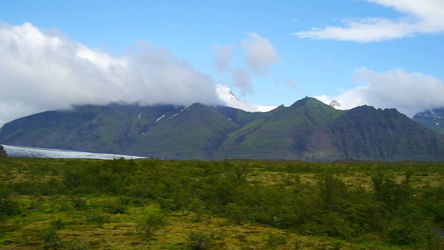 The beautiful and severe nature of Iceland. Glaciers, mountains, clouds.