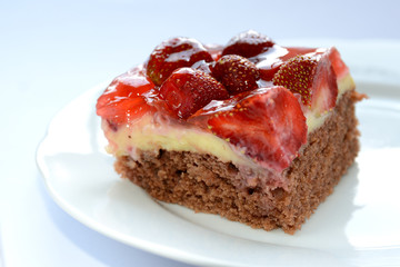 Fresh tasty strawberry cake on a plate