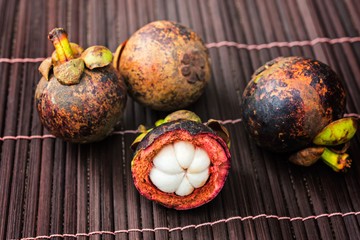 mangosteens on bamboo background , 