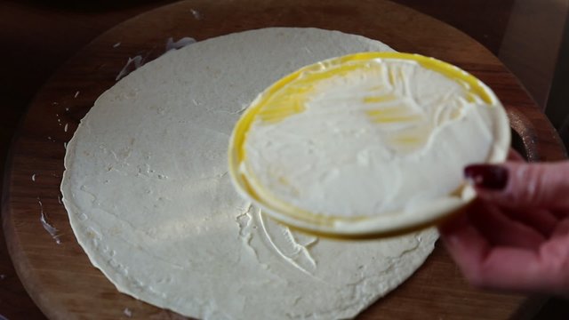 Cooking Mexican tortilla with salmon