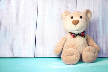 Teddy bear background empty space for text.Birthday toy.