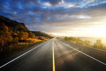 Poster road by the sea in sunrise time,  Lofoten island, Norway © Iakov Kalinin