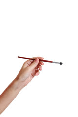 Female hand with brush for make-up isolated on white