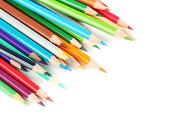 Drawing colourful pencils on a white background, close up
