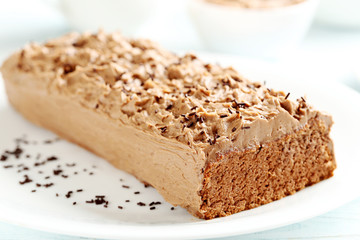 Chocolate cake on a blue wooden background