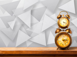 alarm clock on the abstract background