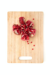 pomegranate on a cutting board