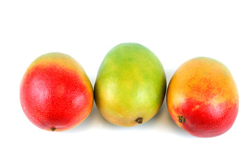 fresh mangoes on white background
