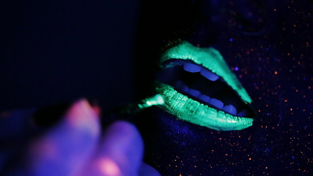 lip color UV fluorescent powder in the light