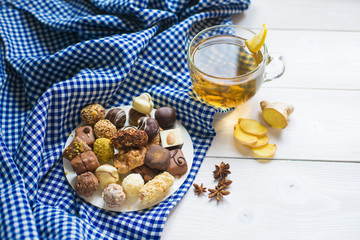 Ginger tea lemon and cinnamon with chocolates