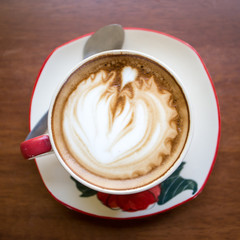 Hot art Latte Coffee in the table