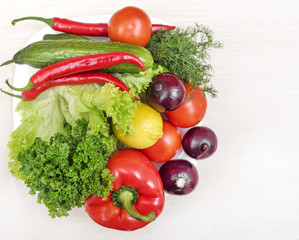 Vegetables for the salad on a plate.