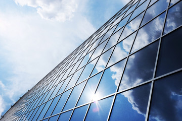 Fototapeta na wymiar modern blue glass wall of skyscraper