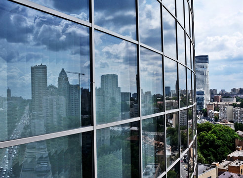 modern blue glass wall of skyscraper