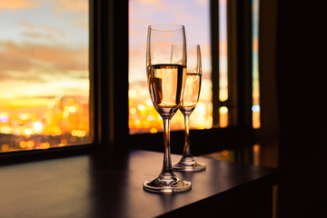 Pair of martini glasses in a romantic setting. 