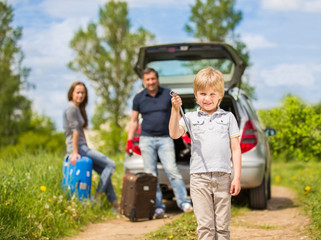 happy family going on a trip by car