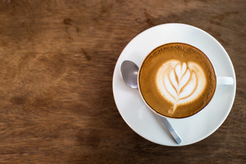 Hot art Latte Coffee in the table