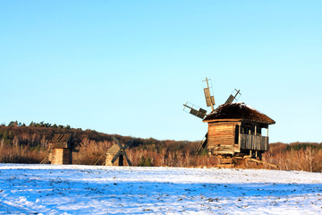 Winter landscape with mills