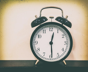  retro alarm clock on table