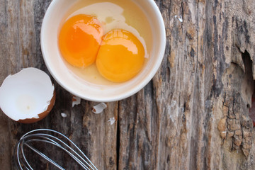 Eggs in a bowl with whisk