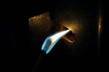 Close-up of lit match 