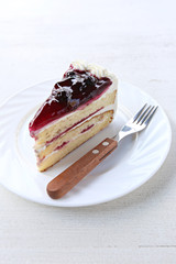 Blueberry cake of sweet dessert in white dish.