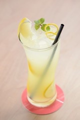 Lemonade in glass with ice and mint
