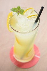 Lemonade in glass with ice and mint