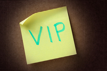 VIP (Very Important Person) acronym on yellow sticky note