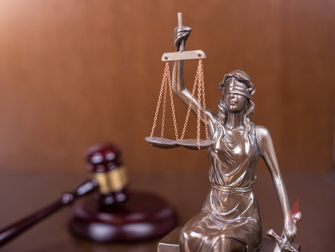 Statue of justice and Wooden gavel, law concept