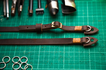 Leather crafting tools with camera strap