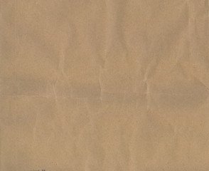 Texture of crumpled brown paper.