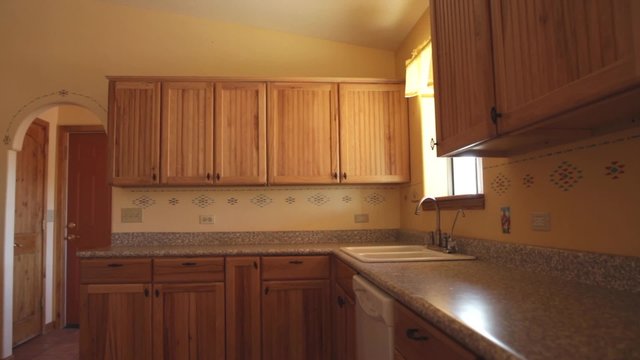 A kitchen in an empty house
