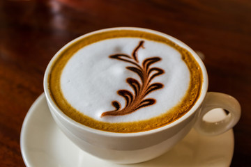 Cappuccino or latte coffee.