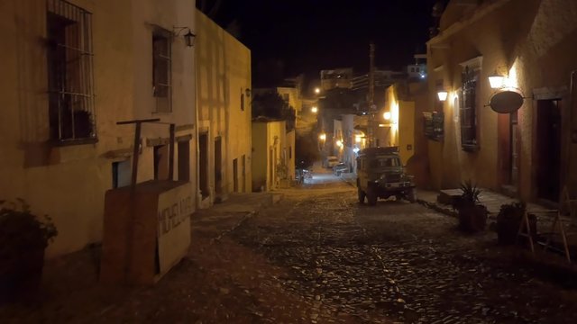 Old willy parked on a beautiful colonial city by night, Real de Catorce, Mexico