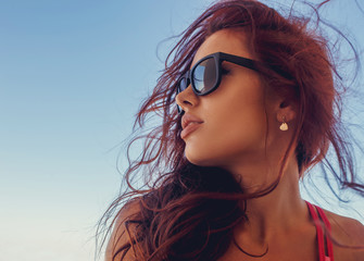 A  woman in a sunglasses.