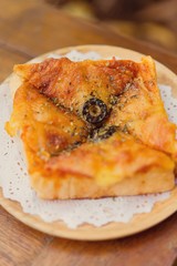 Toasted cheese pizza and onion.