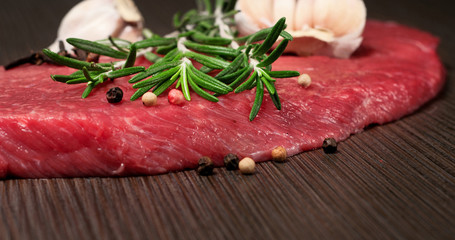raw beef meat on a cutting board