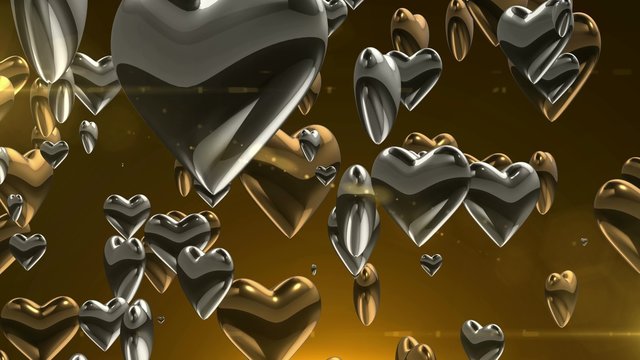 3D animation of chocolate and silver heart symbol in luxury style moving and spinning background pattern in love, wedding anniversary, or valentine concept in 4k ultra HD 
