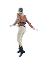 young blonde woman in a steampunk outfit, action hero pose. isolated on white background.