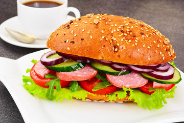 Healthy eating: Fresh sandwich with lettuce, tomato and onion.
