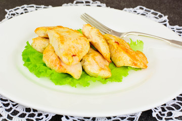 A Piece Turkey in Spices for Grilling on Woody Background