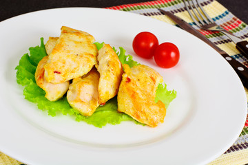 A Piece Turkey in Spices for Grilling on Woody Background