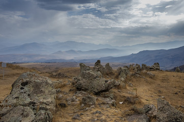 Fototapeta premium Big megalithic menhirs of Zorats Karer (Carahunge) - prehistory megalithic monument in Armenia