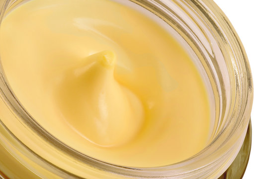 jar with a female face cream