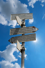 Directional Trail Signs in Mountain - Italian Alps / Typical directional trail signs in mountain in the National Park of Adamello Brenta. Trentino Alto Adige, Italy