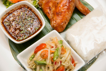  Green papaya salad, grilled chicken and sticky rice