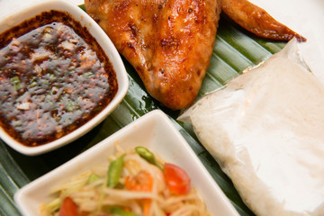  Green papaya salad, grilled chicken and sticky rice