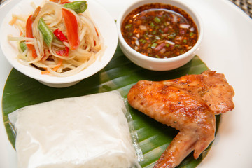  Green papaya salad, grilled chicken and sticky rice
