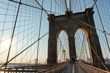 Iconic Brooklyn Bridge Path and Arches at Sunset